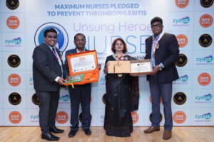 Zydus Healthcare team recieving the Asia Book Of Records and India Book Of Records Award for the NURSE Campaign